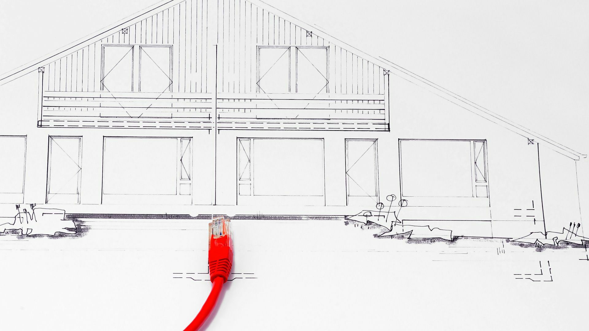 Internetanschluss. Ein rotes Netzwerkkabel führt zu einem gezeichneten Einfamilienhaus